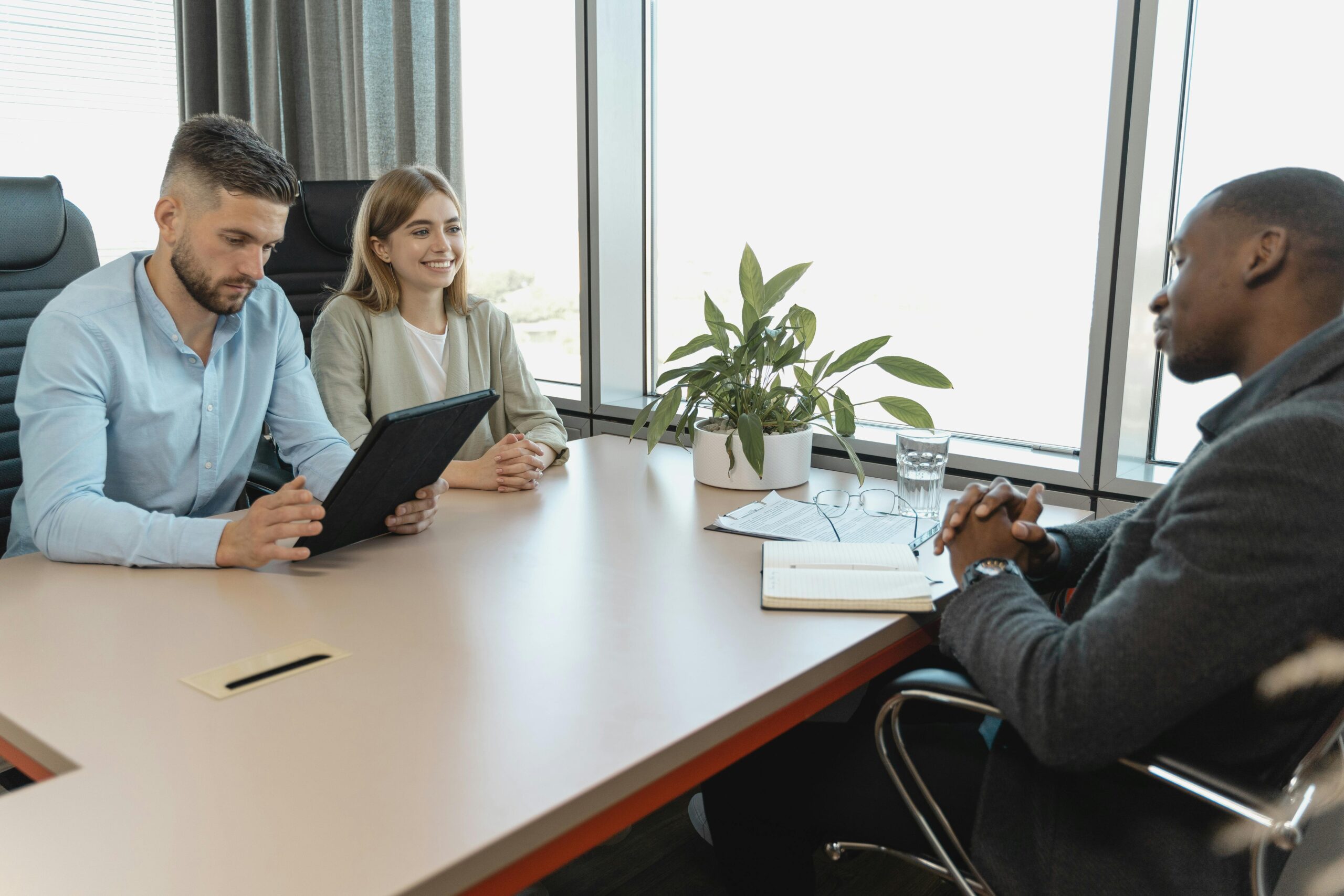 Man sitting at a table for a job interview.